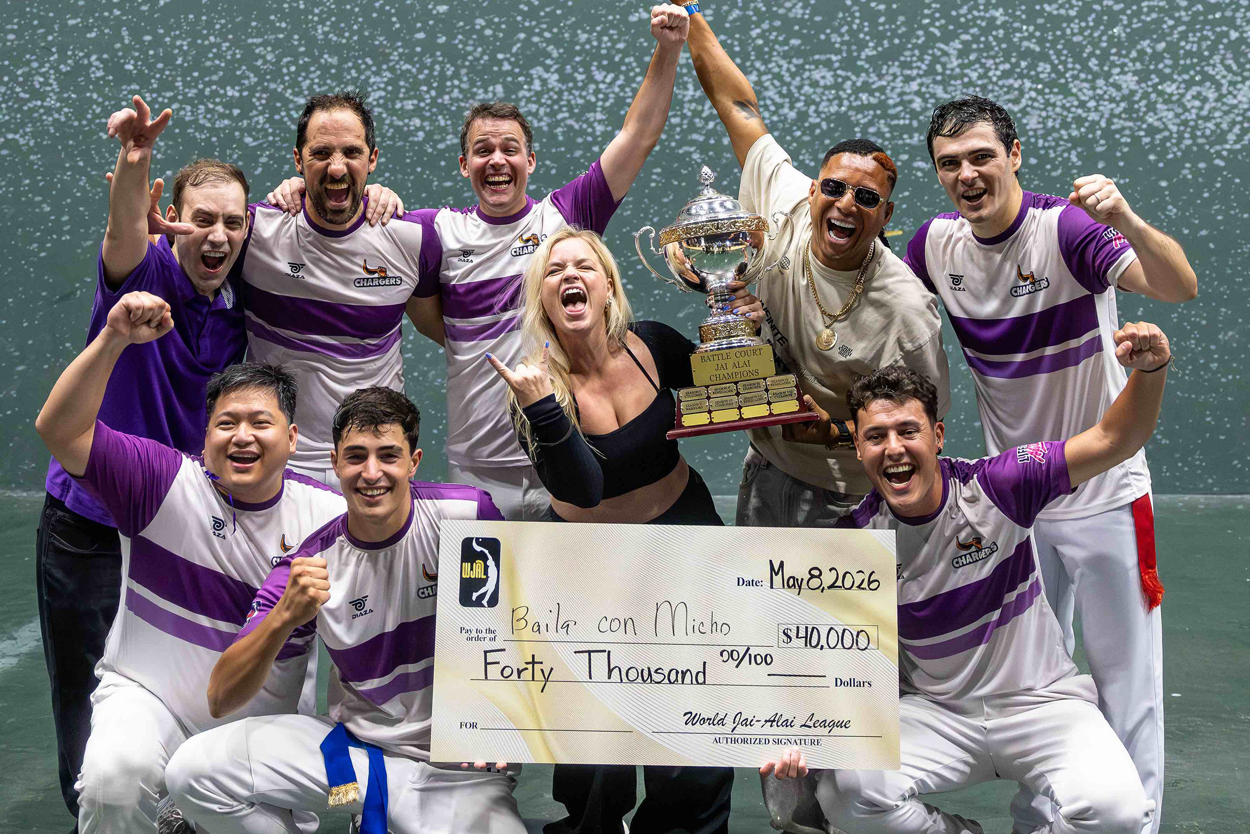 Spring 2026 champions Chargers present ceremonial check to Dancing With Micho For a Purpose
