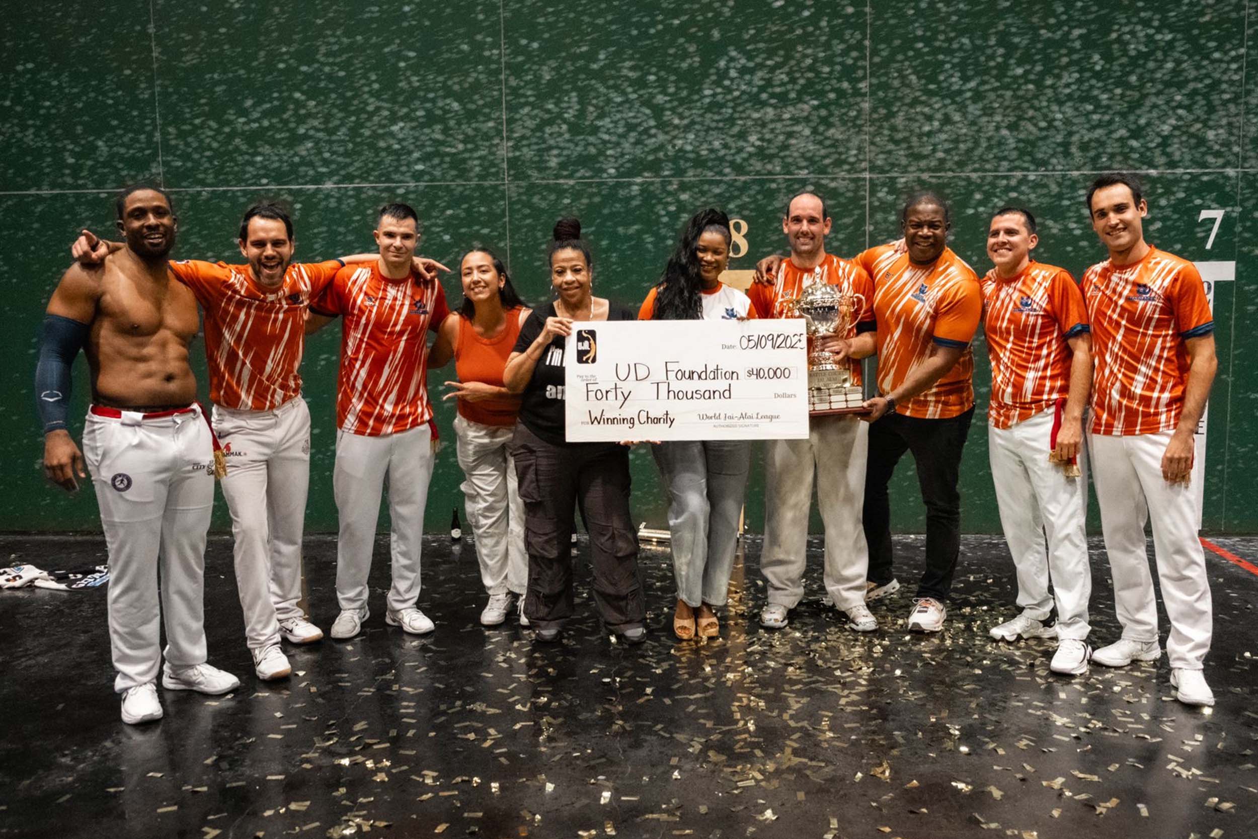 Winter 2025 champions Renegades present ceremonial check to UD Foundation